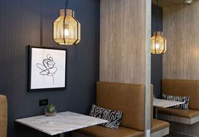 Mooresville apartment for rent - a dining room with a table and chairs and a picture on the wall