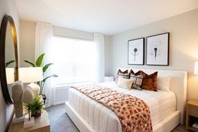 Mooresville apartment for rent - a bedroom with a bed and a window