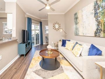 Fairfield apartment for rent - A living room with a white couch and a coffee table in the center.