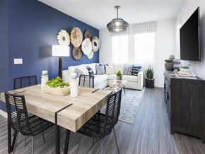 Montclair apartment for rent - A dining room with a wooden table and chairs.