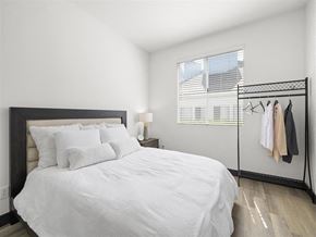 Paramount apartment for rent - a bedroom with a large bed and a closet at Enclave, California