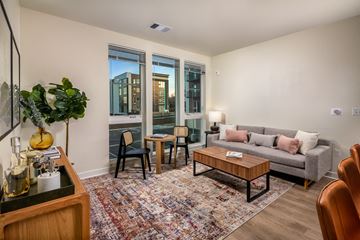 Aurora apartment for rent - a living room with a couch and a coffee table