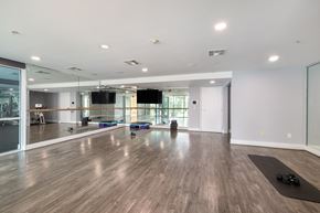 Marina Del Rey apartment for rent - A spacious room with wooden flooring and a ballet barre.