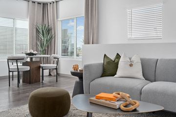 Glendale apartment for rent - a living room with a gray couch and a coffee table