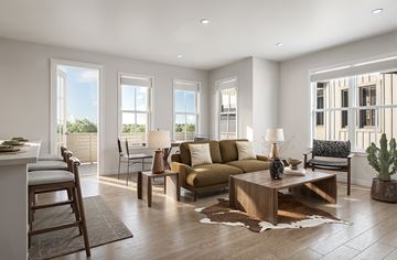 Grand Prairie apartment for rent - A modern living room with a brown cowhide rug and a wooden coffee table.