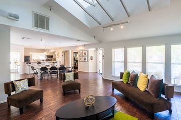 Livermore apartment for rent - A living room with a brown couch and a coffee table.