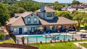 Copperas Cove apartment for rent - A house with a pool in the backyard at Clear Creek Meadows Apartments, Texas, 76522