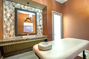 Las Vegas apartment for rent - a room with a table and a mirror