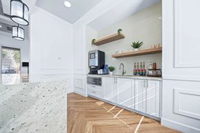Chandler apartment for rent - a white kitchen with a counter and a sink