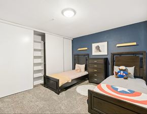 Kennesaw apartment for rent - A bedroom with two beds and a dresser.