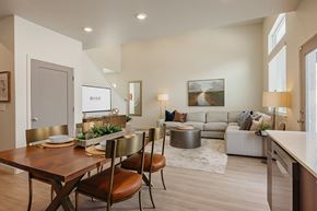 South Jordan townhouse for rent - Dining area with table and chairs at Rise new townhomes in South Jordan, Utah.