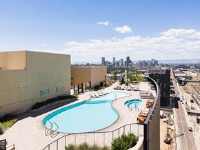 Denver apartment for rent - A swimming pool is located on the roof of a building.