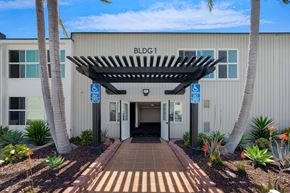Chula Vista apartment for rent - The image shows a building entrance with a sign that reads "BLDG1".