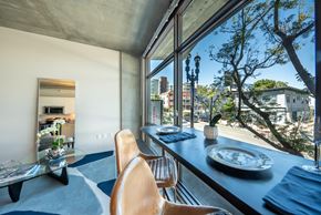 San Diego apartment for rent - A modern dining room with a view of the city.