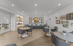 Warwick apartment for rent - A modern dining room with a large table and grey chairs.