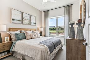 Irving apartment for rent - Large bedroom with dresser at Alta Riverside Las Colinas apartments in Irving, TX.