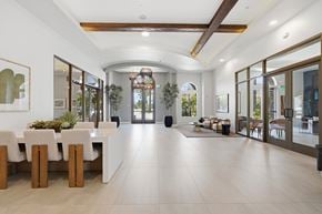 San Diego apartment for rent - A spacious dining area with a long table and chairs.