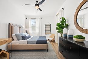 Petaluma apartment for rent - a bedroom with a bed and a ceiling fan