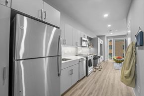 Philadelphia apartment for rent - a kitchen with white cabinetry and stainless steel appliances
