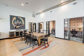 Greeley apartment for rent - a dining room with a wooden table and chairs
