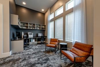 Room with a brown leather chair 
