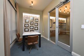 Houston apartment for rent - Clubhouse decor with wall frames at The Flats at West Alabama, Houston, TX, 77027