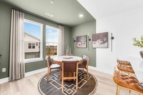Georgetown apartment for rent - A dining room with a round table and chairs.