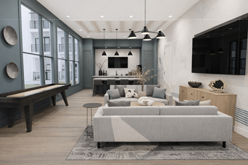 Durham apartment for rent - A modern living room with a grey sofa and a wooden coffee table.