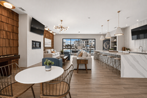Columbia apartment for rent - A modern living room with a white table and chairs.