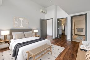 Seattle apartment for rent - Bedroom with a large bed and a closet at Equinox, Seattle, WA, 98102