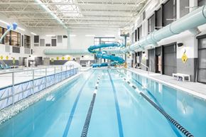 Erie apartment for rent - A large indoor swimming pool with a diving board.