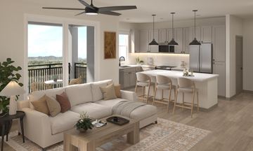 Mesa apartment for rent - A modern living room with a white sofa and a wooden coffee table.