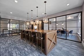 Wilton apartment for rent - a dining room with a wooden table and chairs