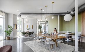 Lynn apartment for rent - A woman is sitting at a table in a modern dining room.