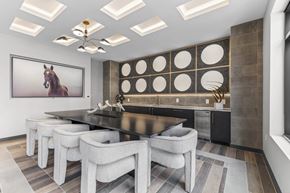 Marlborough apartment for rent - A modern dining room with a large painting of a horse on the wall.