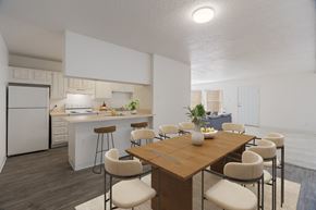 Albuquerque apartment for rent - A modern kitchen with a dining table and chairs.