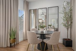 Tempe apartment for rent - A dining room with a round table and chairs.