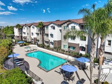 Chula Vista apartment for rent - A sunny day at the pool of a residential building.
