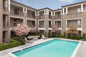 Danville apartment for rent - an apartment building with a swimming pool in front of it