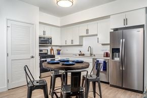 El Monte apartment for rent - El Monte apartment kitchen with large fridge at Aston at Gateway apartments