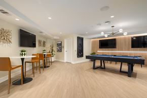 Rancho Cucamonga apartment for rent - A room with a pool table and a television.