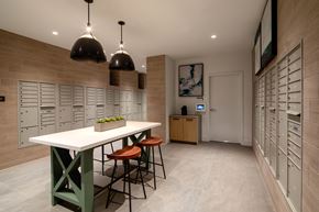Chula Vista apartment for rent - A modern dining area with a white table and chairs.