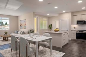 Murrieta apartment for rent - A modern dining room with a table set for four.