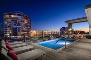 Long Beach apartment for rent - a pool on the rooftop of an apartment building at night