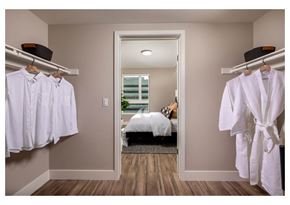 Inglewood apartment for rent - A bedroom with a bed and a window.