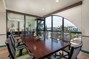 Escondido apartment for rent - A conference room with a long table and chairs.