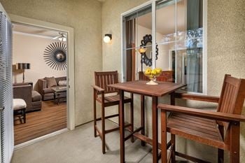 Energy-efficient dual pane windows  with a wooden table and chairs