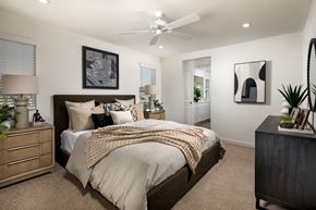 Lancaster apartment for rent - a bedroom with a bed and a ceiling fan