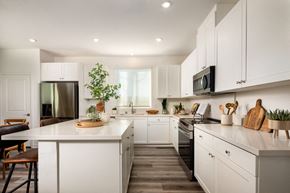 Lancaster apartment for rent - a kitchen with white cabinets and a white counter top