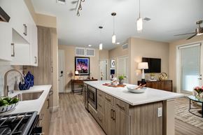 Rancho Cucamonga apartment for rent - a kitchen with a large island in the middle